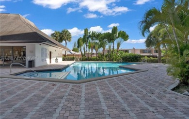 SPECTACULAR totally remodeled unit at The Towers of Kendale on Miccosukee Golf and Country Club in Florida - for sale on GolfHomes.com, golf home, golf lot