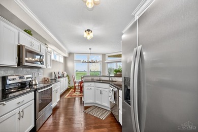 Step into a meticulous first-floor end unit with stunning Shaker on Shaker Run Golf Club  in Ohio - for sale on GolfHomes.com, golf home, golf lot