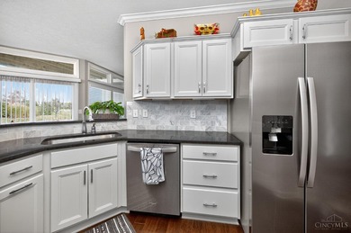 Step into a meticulous first-floor end unit with stunning Shaker on Shaker Run Golf Club  in Ohio - for sale on GolfHomes.com, golf home, golf lot