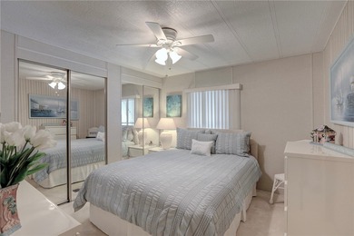 Furnished beauty just steps from the golf course! This on Barefoot Bay Golf Course in Florida - for sale on GolfHomes.com, golf home, golf lot