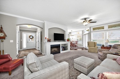 Step into a meticulous first-floor end unit with stunning Shaker on Shaker Run Golf Club  in Ohio - for sale on GolfHomes.com, golf home, golf lot