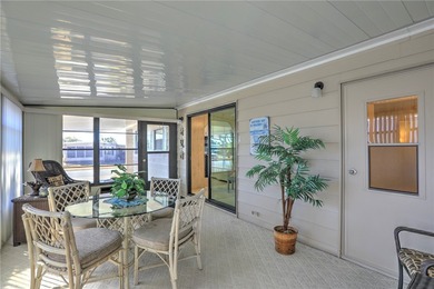 Furnished beauty just steps from the golf course! This on Barefoot Bay Golf Course in Florida - for sale on GolfHomes.com, golf home, golf lot