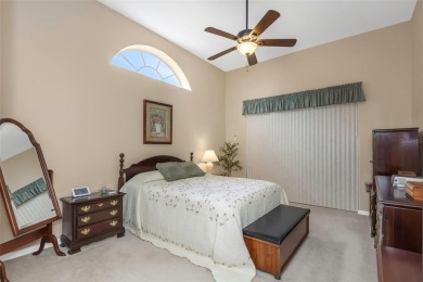Discover timeless elegance and peaceful living in this stunning on The Links Golf Course in Florida - for sale on GolfHomes.com, golf home, golf lot