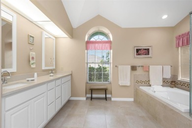 Discover timeless elegance and peaceful living in this stunning on The Links Golf Course in Florida - for sale on GolfHomes.com, golf home, golf lot