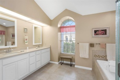 Discover timeless elegance and peaceful living in this stunning on The Links Golf Course in Florida - for sale on GolfHomes.com, golf home, golf lot
