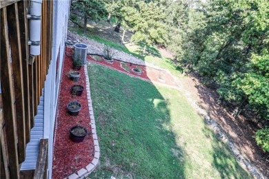 Discover the charm and elegance of this beautiful 2,452 sq ft on Holiday Island Golf Course in Arkansas - for sale on GolfHomes.com, golf home, golf lot