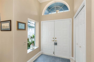 Discover timeless elegance and peaceful living in this stunning on The Links Golf Course in Florida - for sale on GolfHomes.com, golf home, golf lot
