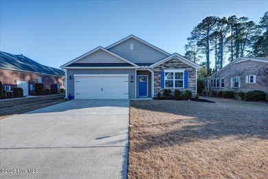 Welcome to 2021 Caracara Drive, located in the gated Fairfield on Harbour Point Golf Club in North Carolina - for sale on GolfHomes.com, golf home, golf lot
