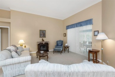 Discover timeless elegance and peaceful living in this stunning on The Links Golf Course in Florida - for sale on GolfHomes.com, golf home, golf lot