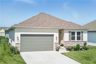 Nestled beside Stone Canyon Golf Course, this immaculate on Stone Canyon Golf Club in Missouri - for sale on GolfHomes.com, golf home, golf lot