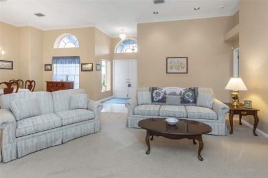 Discover timeless elegance and peaceful living in this stunning on The Links Golf Course in Florida - for sale on GolfHomes.com, golf home, golf lot