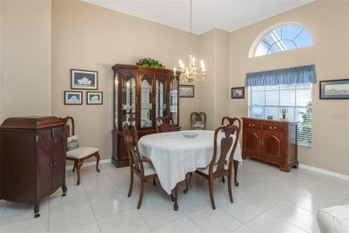 Discover timeless elegance and peaceful living in this stunning on The Links Golf Course in Florida - for sale on GolfHomes.com, golf home, golf lot