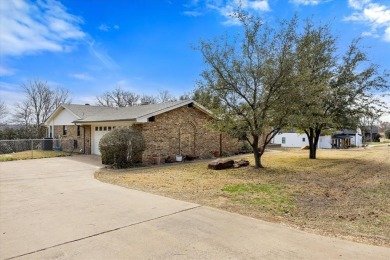 Nestled in the prestigious Pecan Plantation Country Club (PPCC) on Pecan Plantation Country Club in Texas - for sale on GolfHomes.com, golf home, golf lot