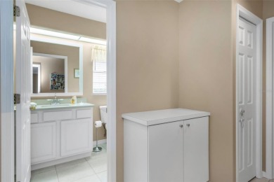 Discover timeless elegance and peaceful living in this stunning on The Links Golf Course in Florida - for sale on GolfHomes.com, golf home, golf lot