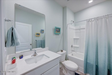 Welcome to 2021 Caracara Drive, located in the gated Fairfield on Harbour Point Golf Club in North Carolina - for sale on GolfHomes.com, golf home, golf lot