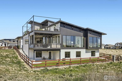 Welcome to elevated Colorado living at its finest. Perched above on Raindance National Golf Course in Colorado - for sale on GolfHomes.com, golf home, golf lot