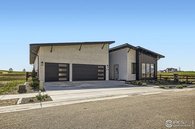 Welcome to elevated Colorado living at its finest. Perched above on Raindance National Golf Course in Colorado - for sale on GolfHomes.com, golf home, golf lot
