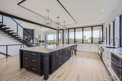 Welcome to elevated Colorado living at its finest. Perched above on Raindance National Golf Course in Colorado - for sale on GolfHomes.com, golf home, golf lot