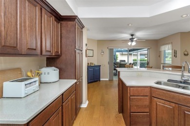 Discover timeless elegance and peaceful living in this stunning on The Links Golf Course in Florida - for sale on GolfHomes.com, golf home, golf lot