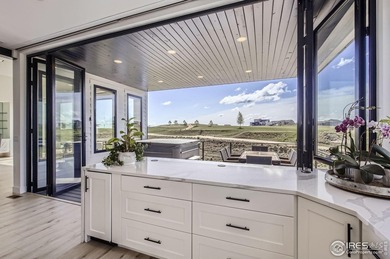 Welcome to elevated Colorado living at its finest. Perched above on Raindance National Golf Course in Colorado - for sale on GolfHomes.com, golf home, golf lot