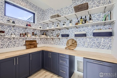 Welcome to elevated Colorado living at its finest. Perched above on Raindance National Golf Course in Colorado - for sale on GolfHomes.com, golf home, golf lot