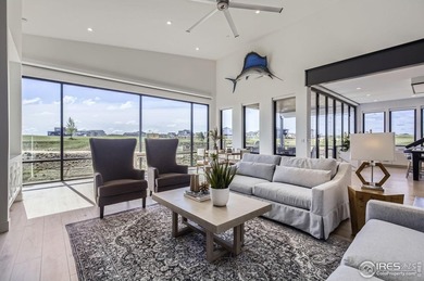 Welcome to elevated Colorado living at its finest. Perched above on Raindance National Golf Course in Colorado - for sale on GolfHomes.com, golf home, golf lot