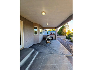 Beautiful, spacious home located at the 7th and 8th hole of on Desert Hawk At Pueblo West in Colorado - for sale on GolfHomes.com, golf home, golf lot