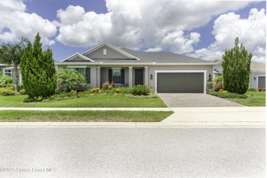 Enjoy lake views and vibrant sunsets from your gas-heated pool on Duran Golf Course in Florida - for sale on GolfHomes.com, golf home, golf lot