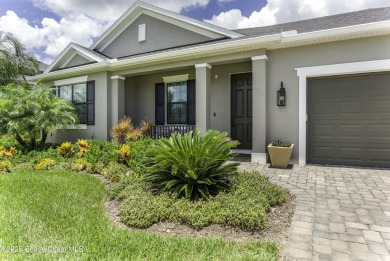 Enjoy lake views and vibrant sunsets from your gas-heated pool on Duran Golf Course in Florida - for sale on GolfHomes.com, golf home, golf lot