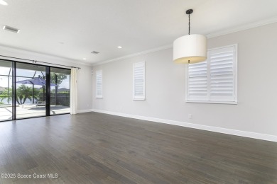 Enjoy lake views and vibrant sunsets from your gas-heated pool on Duran Golf Course in Florida - for sale on GolfHomes.com, golf home, golf lot