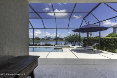 Enjoy lake views and vibrant sunsets from your gas-heated pool on Duran Golf Course in Florida - for sale on GolfHomes.com, golf home, golf lot