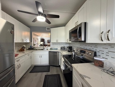 Priced to Sell!!! Spacious, beautiful and fully remodeled corner on  in Florida - for sale on GolfHomes.com, golf home, golf lot