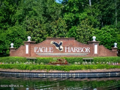 Stunning 4-Bedroom Home with Golf Course Views on Quiet on Eagle Harbor Golf Club in Florida - for sale on GolfHomes.com, golf home, golf lot