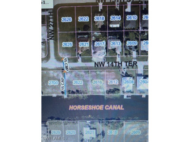 ** Amazing Freshwater Canal  ** SEAWALL ALREADY IN ** Build Your on Coral Oaks Golf Course in Florida - for sale on GolfHomes.com, golf home, golf lot