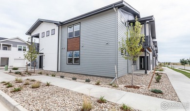 Lock-and-leave living at its best! Move-in ready and designed on Raindance National Golf Course in Colorado - for sale on GolfHomes.com, golf home, golf lot