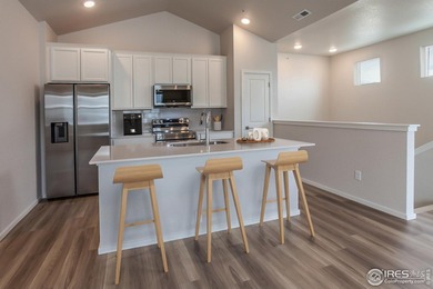 Lock-and-leave living at its best! Move-in ready and designed on Raindance National Golf Course in Colorado - for sale on GolfHomes.com, golf home, golf lot