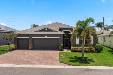 Under contract-accepting backup offers. Only 6 years old and on Lake Ashton Golf Club in Florida - for sale on GolfHomes.com, golf home, golf lot