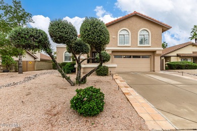 So much to love about this home! This 4 bedroom, 2.5 bath home on The Lakes at Ahwatukee in Arizona - for sale on GolfHomes.com, golf home, golf lot
