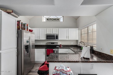 Become the proud owner of this 2-bed, 2-bath townhome in the on Palm Valley Golf Club  in Arizona - for sale on GolfHomes.com, golf home, golf lot