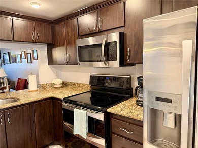 SUBSTENTIAL PRICE REDUCTION. MOTIVATED SELLER OFFERS TO PRE-PAY on Sunrise Lakes Phase IV Golf Course in Florida - for sale on GolfHomes.com, golf home, golf lot