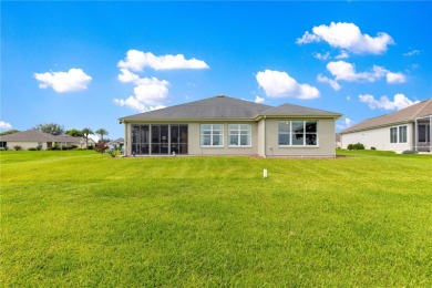 Welcome to this exquisite Home in Guard Gated Del Webb Spruce on Eagle Ridge At Spruce Creek Country Club in Florida - for sale on GolfHomes.com, golf home, golf lot
