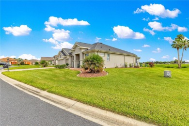 Welcome to this exquisite Home in Guard Gated Del Webb Spruce on Eagle Ridge At Spruce Creek Country Club in Florida - for sale on GolfHomes.com, golf home, golf lot