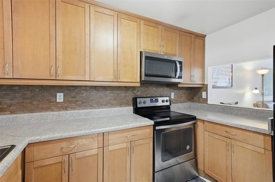 Rent from day 1. Updated 2-bedroom, 2-bath residence featuring a on Pine Island Ridge Country Club in Florida - for sale on GolfHomes.com, golf home, golf lot