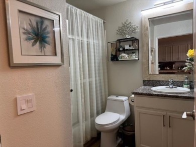 Located on a scenic cul-de-sac, this beautifully renovated home on Villages Golf and Country Club in California - for sale on GolfHomes.com, golf home, golf lot