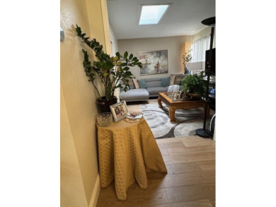 Located on a scenic cul-de-sac, this beautifully renovated home on Villages Golf and Country Club in California - for sale on GolfHomes.com, golf home, golf lot