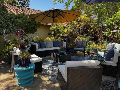 Located on a scenic cul-de-sac, this beautifully renovated home on Villages Golf and Country Club in California - for sale on GolfHomes.com, golf home, golf lot