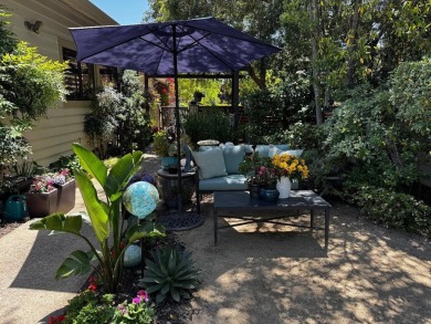 Located on a scenic cul-de-sac, this beautifully renovated home on Villages Golf and Country Club in California - for sale on GolfHomes.com, golf home, golf lot