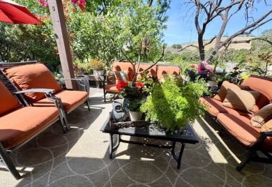 Located on a scenic cul-de-sac, this beautifully renovated home on Villages Golf and Country Club in California - for sale on GolfHomes.com, golf home, golf lot