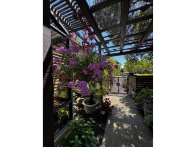 Located on a scenic cul-de-sac, this beautifully renovated home on Villages Golf and Country Club in California - for sale on GolfHomes.com, golf home, golf lot