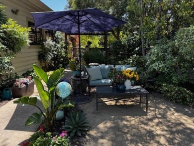 Located on a scenic cul-de-sac, this beautifully renovated home on Villages Golf and Country Club in California - for sale on GolfHomes.com, golf home, golf lot